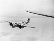 Asisbiz Bristol Blenheim IV RAF 14Sqn White N Z7631 in flight over the Western Desert IWM CM3105