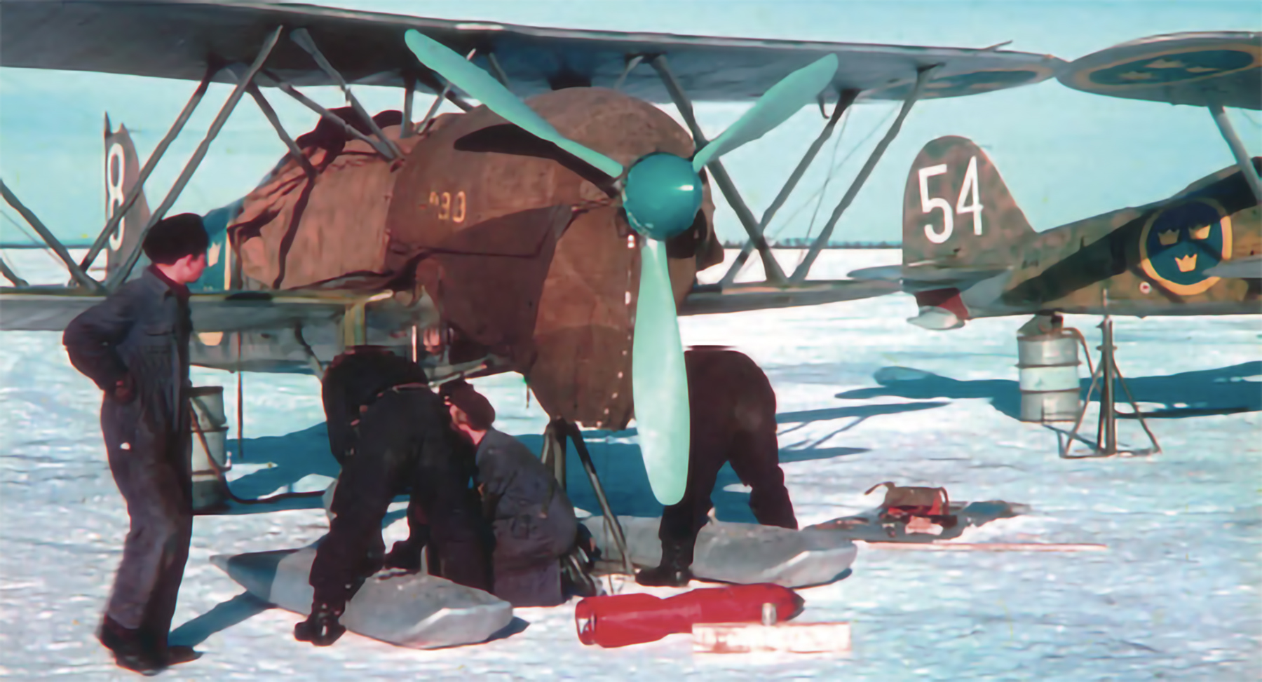 Fiat CR 42 Falco RSWAF White 54 being fitted with winter skis Sweden 1941 01