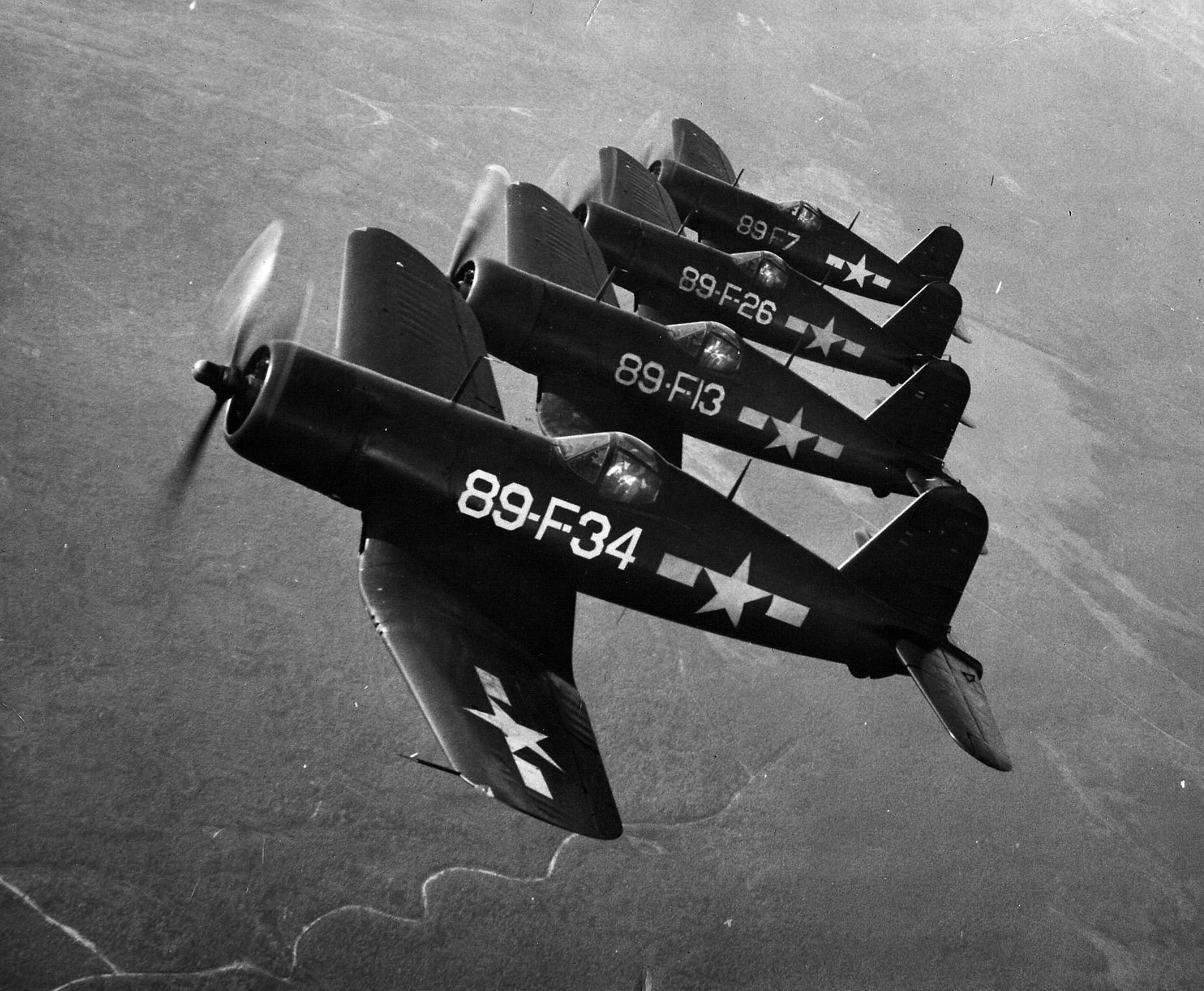 Vought F4U-1A Corsair VBF 89 White 89F34 89F13 89F26 and 89F7 in flight near Atlantic City NJ 01
