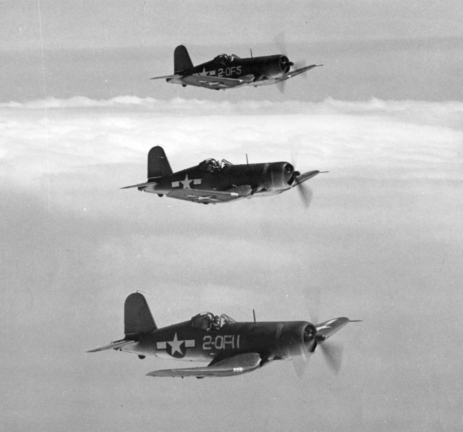Vought F4U-1D Corsair VOF 2 White 20F11 and 20F5 are in flight formation near Atlantic City NJ 02