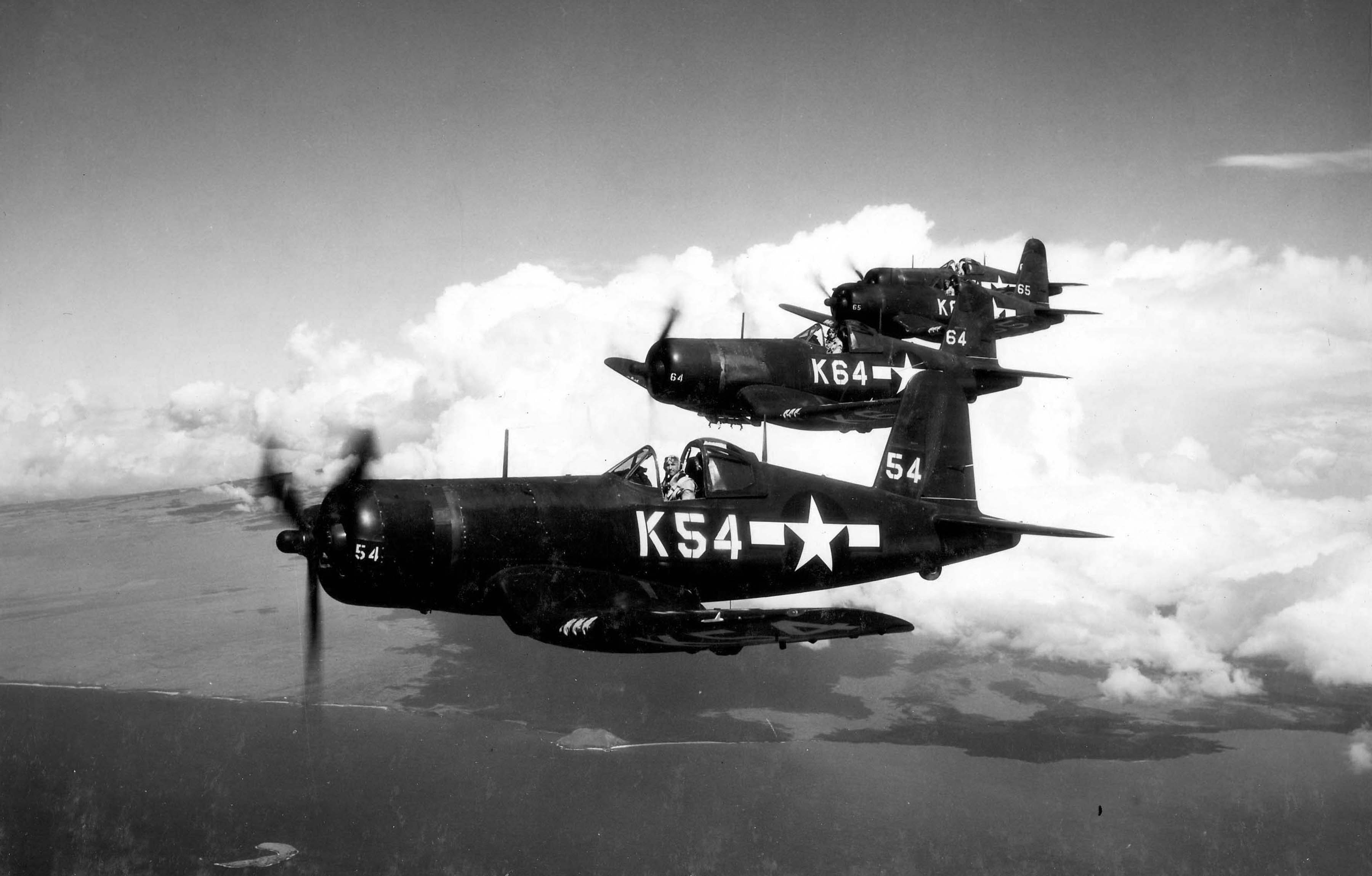 Vought F4U-1D Corsairs VBF 86 White K54 K64 and K65 on patrol over CV-18 USS Wasp 01