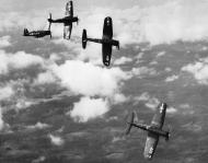 Asisbiz Vought F4U 4 Corsair VF 14 White T401 T412 T408 and T404 in formation 1949 01