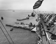 Asisbiz Vought F4U 4 Corsairs being offloaded USS Altamaha at Guiuan Harbor Samar Philippines 1st May 1945 01