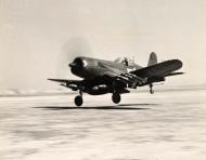 Asisbiz Vought F4U-5D Corsair 1MAW carrying Napalm and rockets takes off from a forward airbase in Korea c1950 01