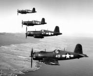 Asisbiz Vought F4U 1D Corsairs White 49 47 50 and 41 in formation over Hawaii 1945 01