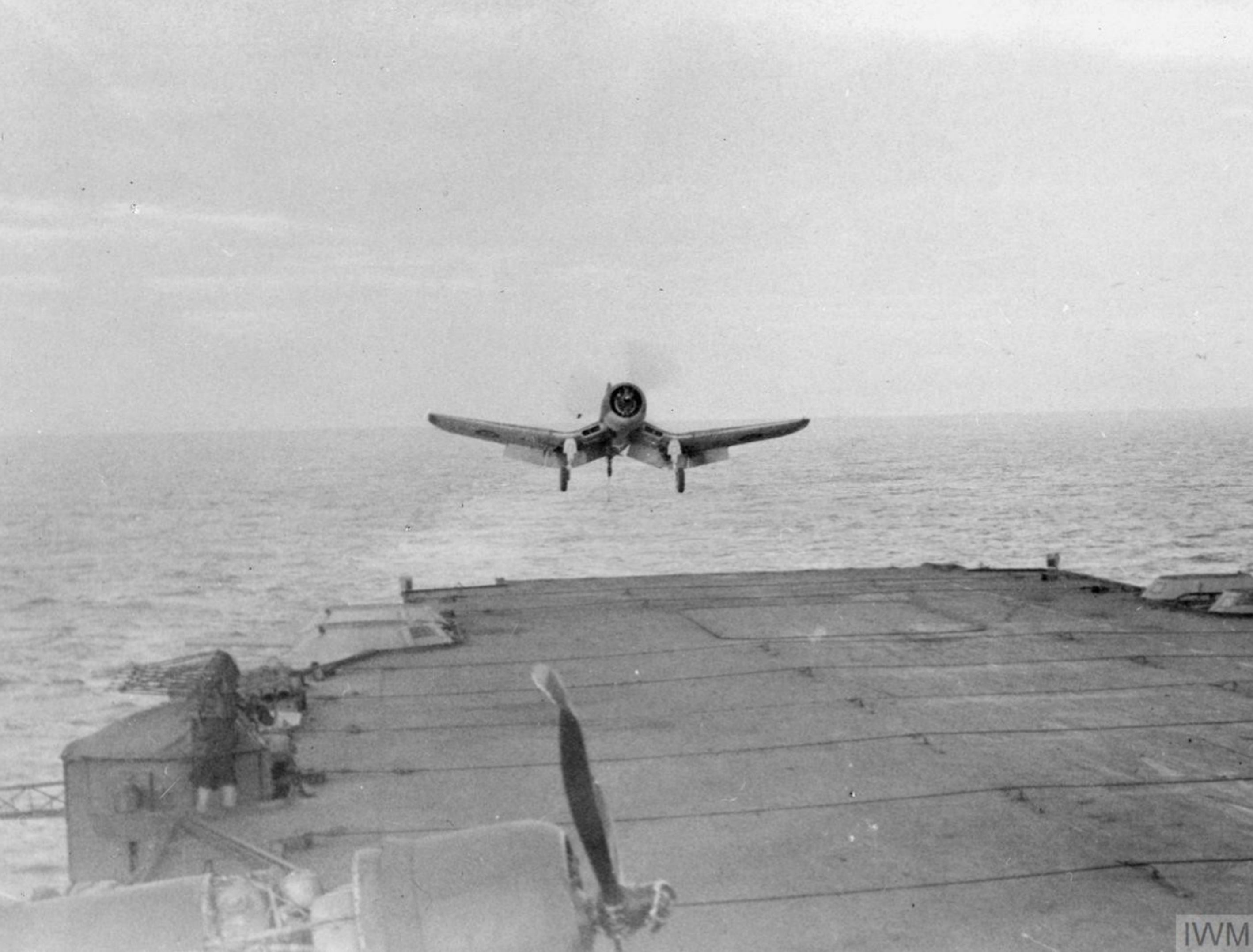 Fleet Air Arm 1830NAS Corsair II Red 7D landing aboard HMS Illustrious Dec 1943 IWM A20996