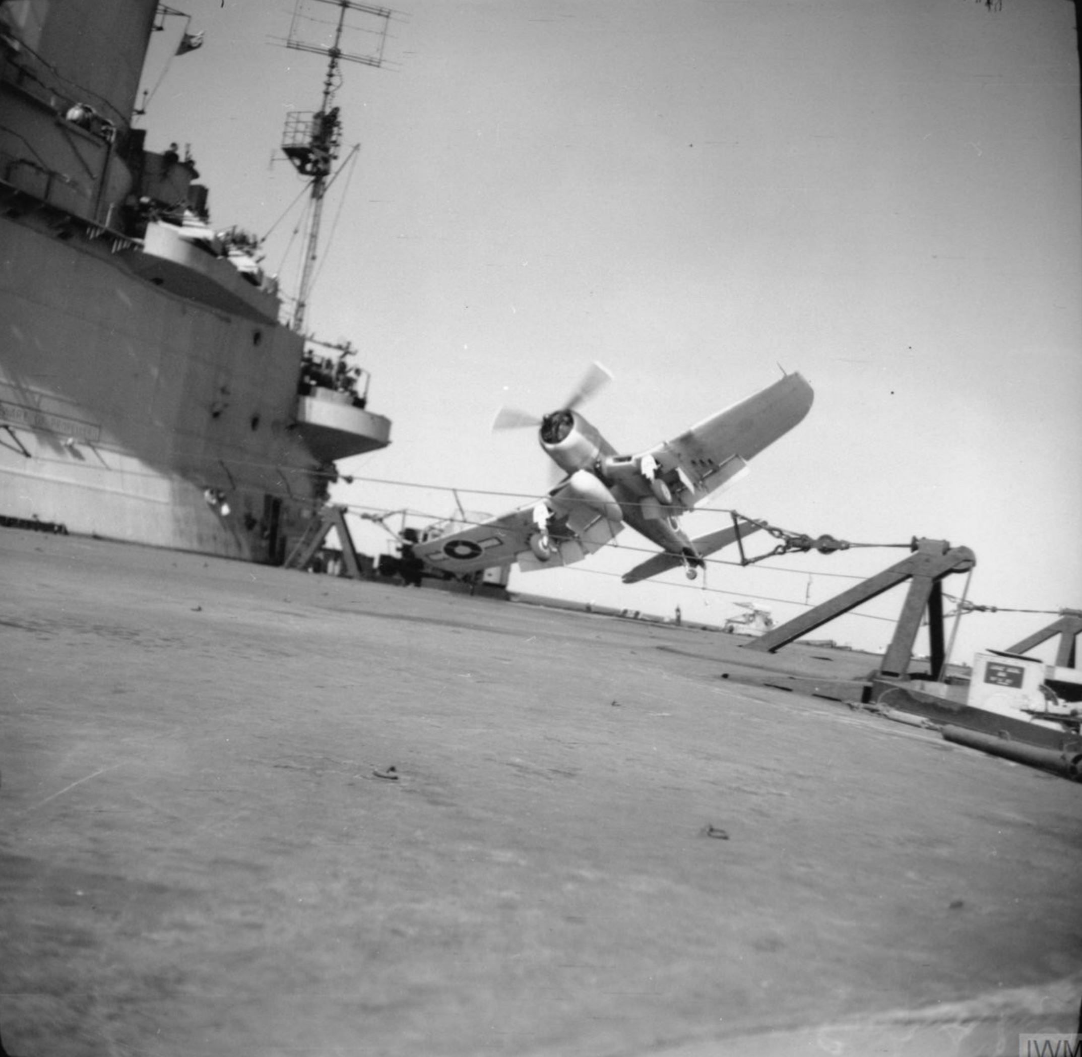 https://www.asisbiz.com/il2/Corsair/RN1830/images/Fleet-Air-Arm-1830NAS-Corsair-Q147-landing-mishap-aboard-HMS-Illustrious-13th-Apr-1945-IWM-A29271.jpg