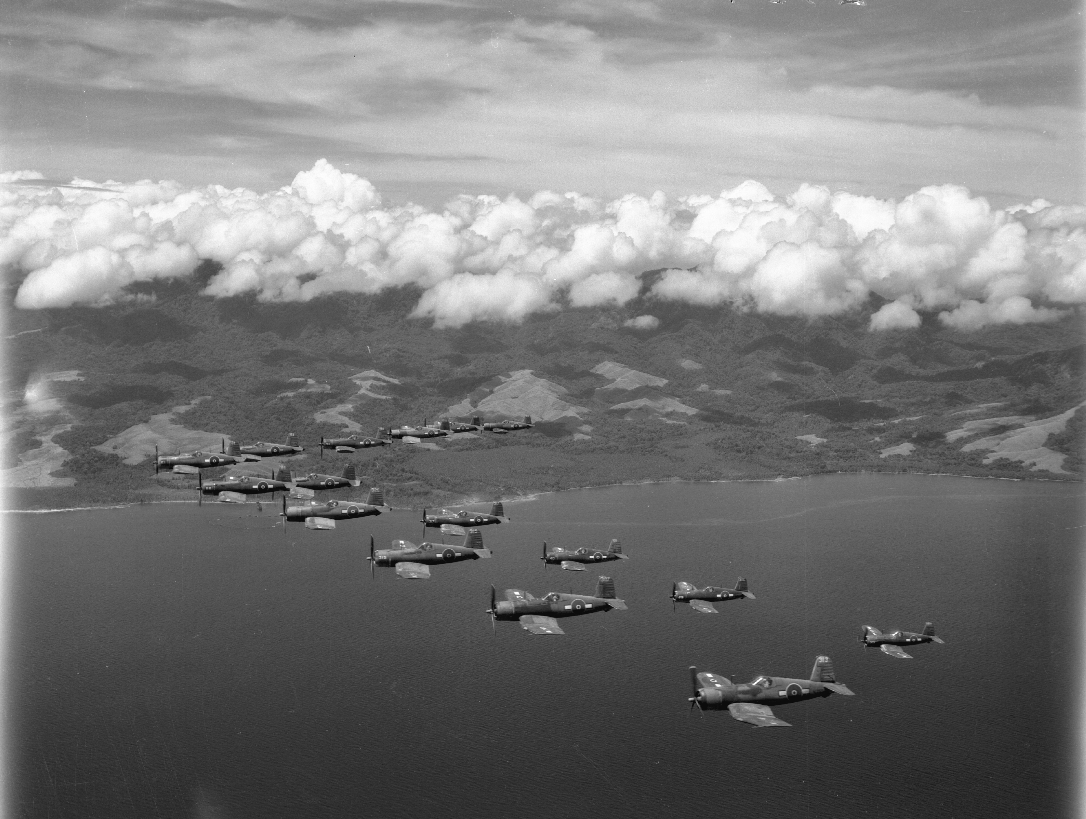 Vought F4U 1D Corsair RNZAF 18Sqn in formation over the ocean near Guadalcanal 01