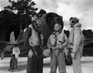 Asisbiz Aircrew RNZAF 23Sqn SqnLdr JJ de Willimoff FLt AM Davis and FSgt Walls with a Corsair at Emirau 01