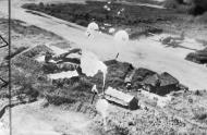 Asisbiz Parachute bombs dropping on one of the complex of airfields around Rabaul New Britain Dec 1943 May 1944 IWM EA4397