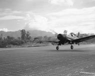 Asisbiz RNZAF 2 Servicing Unit Corsair NZ5444 taking off from a Marston matting strip Piva Bougainville 01