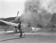 Asisbiz Vought F4U 1D Corsair RNZAF 15Sqn PO NW McCready White 67 NZ5367 caught fire at Green Island 02