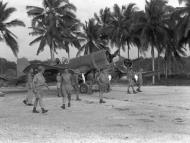 Asisbiz Vought F4U 1D Corsair RNZAF 20Sqn being refueled at Guadalcanal 02