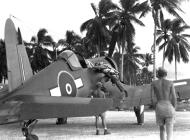 Asisbiz Vought F4U 1D Corsair RNZAF 20Sqn climbing aboard his mount Torokina Bougainville 1945 01