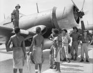 Asisbiz Vought F4U 1D Corsair RNZAF Australian servicemen and locals at Jacquinot Bay New Britain 02