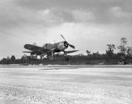 Asisbiz Vought F4U 1D Corsair RNZAF with long range fuel tanks landing at Jacquinot Bay New Britain 01