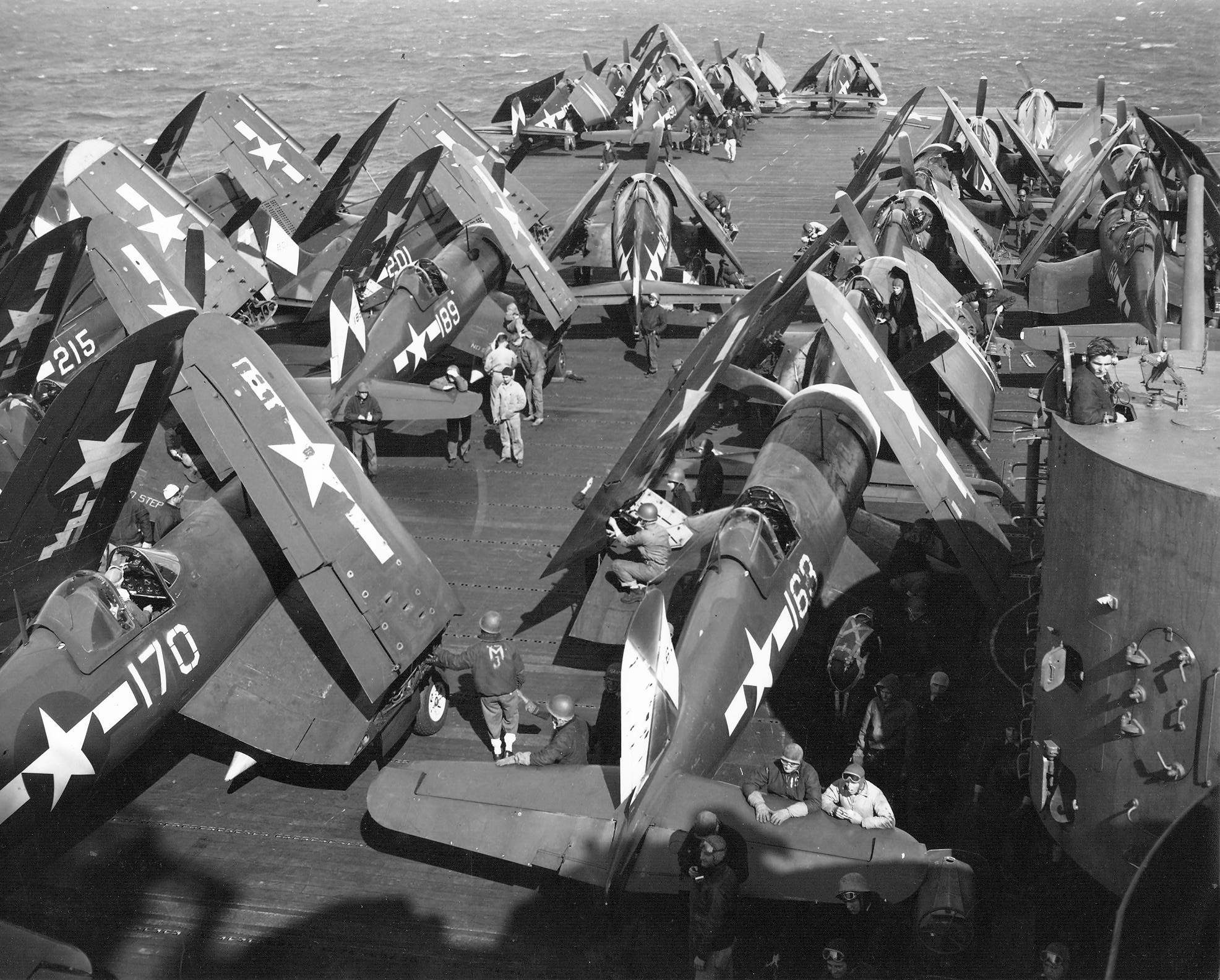 Vought F4U 1D Corsairs VBF 83 White 170163189215 and 201 aboard USS Essex CV 9 heading to Japan 1945 01