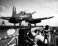 Asisbiz Vought F4U 4 Corsair VBF 83 White F238 launches from the flight deck of CV 9 USS Essex Aug 1945 01