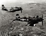 Asisbiz Vought F4U 5NL Corsair VC 3 White NP14 BuNo 123187 with a Skyraider Korea 01