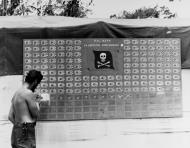 Asisbiz Adding 'Kill' flags to the squadron's scoreboard bringing the total to 154 Japanese planes destroyed 23rd Mar 1944 80 G 220335