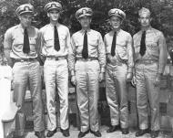 Asisbiz Aircrew USN VF 17 Aces pose with Rear Admiral JJ Ballentine after their rotation from the combat zone 22nd March 1944 80 G 220346