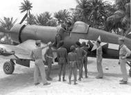 Asisbiz Vought F4U 1A Corsair VF 85 pilots showing the local New Guinea natives their fighters 01
