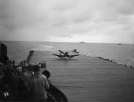Asisbiz Vought F4U 1D Corsair VBF 85 White Z32 emergency landing on the USS Shangri La CV 38 21st July 1945 01