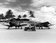 Asisbiz Vought F4U 1A Corsair VMF 122 White 804 and 707 taxing Palau Islands 1945 01