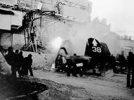 Asisbiz Vought F4U-1D Corsair VMF-123 White 38 burns after a landing misshap USS Bennington (CV 20) 14th Feb 1945 02