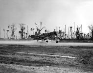 Asisbiz Vought F4U 1 Corsairs VMF 124 taxis along the airstrip at Munda Point 26th Aug 1943 01