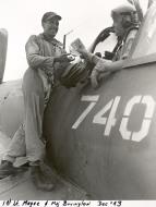 Asisbiz Aircrew USMC VMF 214 Maj Boylngton hands the meatball tokens to Lt Magee in exchange for the Cardinals caps 4th Dec 1943 02