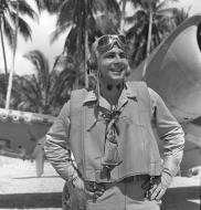 Asisbiz Aircrew USMC VMF 214 pilot 1st Lt Denmark Groover holding his Purple Heart on Vella Lavella 5th Dec 1943