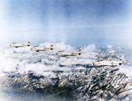 Asisbiz North American FJ 4 Furys VMA 214 Black Sheep WE3618 WE3621 WE3632 and WE3597 in flight over Japan Dec 1958 01