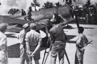 Asisbiz Vought F4U 1A Corsair VMF 214 Black Sheep White 507 being filmed Bougainville 1943 01