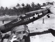 Asisbiz Vought F4U 1D Corsair VMF 214 Black Sheep White 777 BuNo 17777 overturned on landing 16th Dec 1943 01