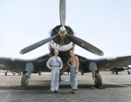 Asisbiz Vought F4U 1D Corsair VMF 214 Capt John Bolt with mechanic Carl E Pierce after flight endurance tests of over 14 hours 13th May 1945 02