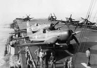 Asisbiz Vought F4U 4B Corsair VMF 214 Black Sheep WE3 and WE22 aboard CVE 118 USS Sicily off Korea late 1950 01