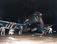 Asisbiz Vought F4U 4B Corsair VMF 214 Black Sheep WE7 being readied for a mission aboard USS Sicily off Korea Aug Nov 1950 01