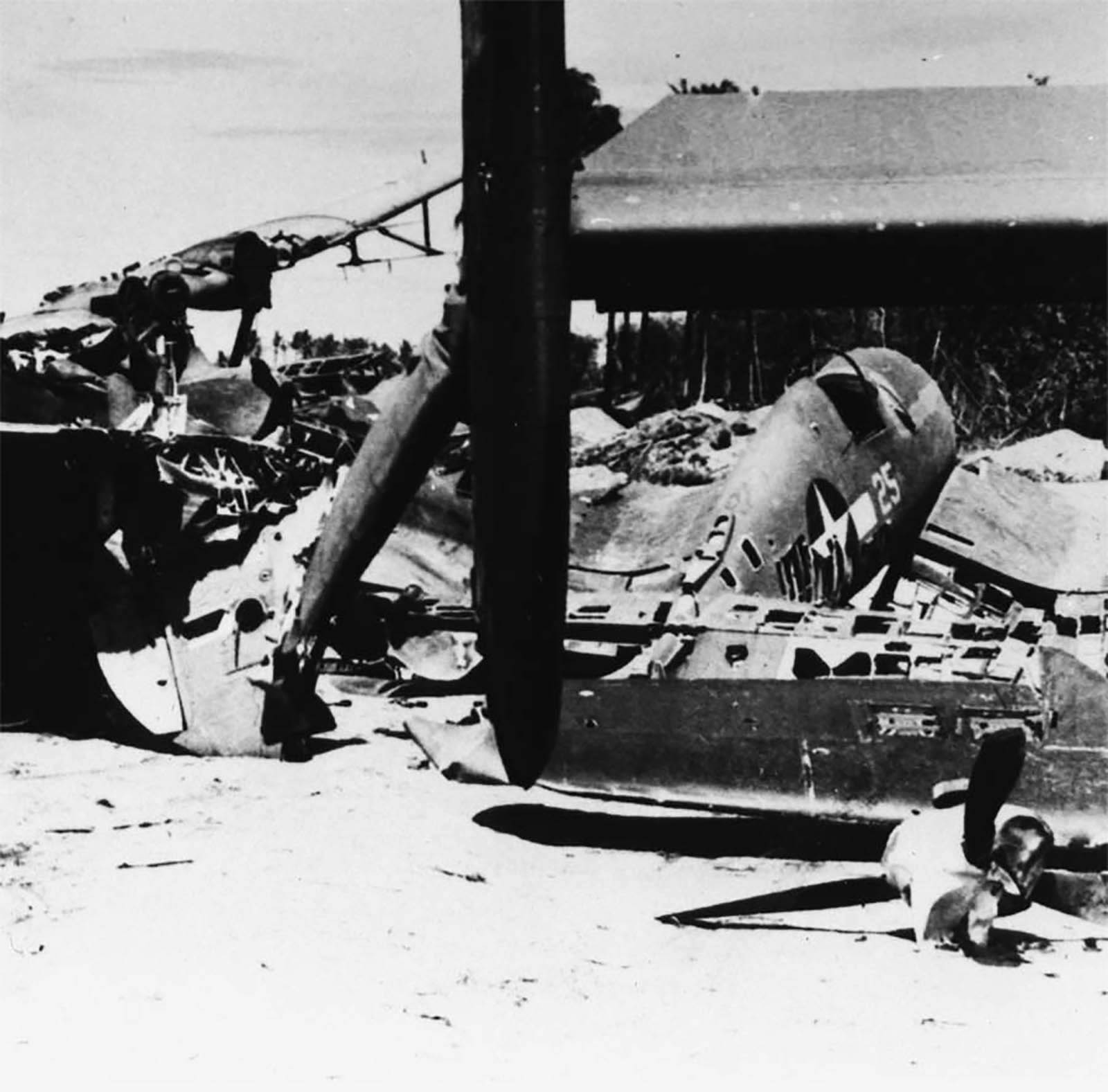 Vought F4U-1 Corsairs VMF-216 White 25 scrapped at Cape Torokina Bougainville Dec 1943 01