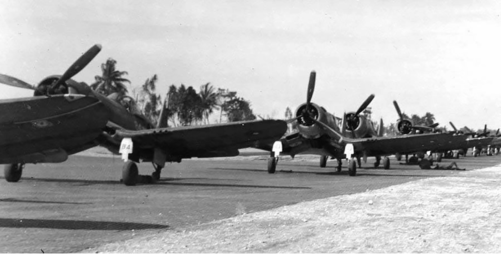 Vought F4U 1A Corsairs VMF 216 White 84 and 10 parked at Cape Torokina Bougainville 17th Dec 1943 01