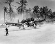 Asisbiz Vought F4U 1A Corsair VMF 224 White 272 and 267 preparing for take off Majuro Marshall Islands 1944 01
