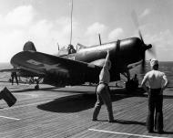 Asisbiz Vought F4U 1D Corsair VMF 224 on the catapult ready to launch USS Sitkoh Bay CVE 86 28th Mar 1945 01