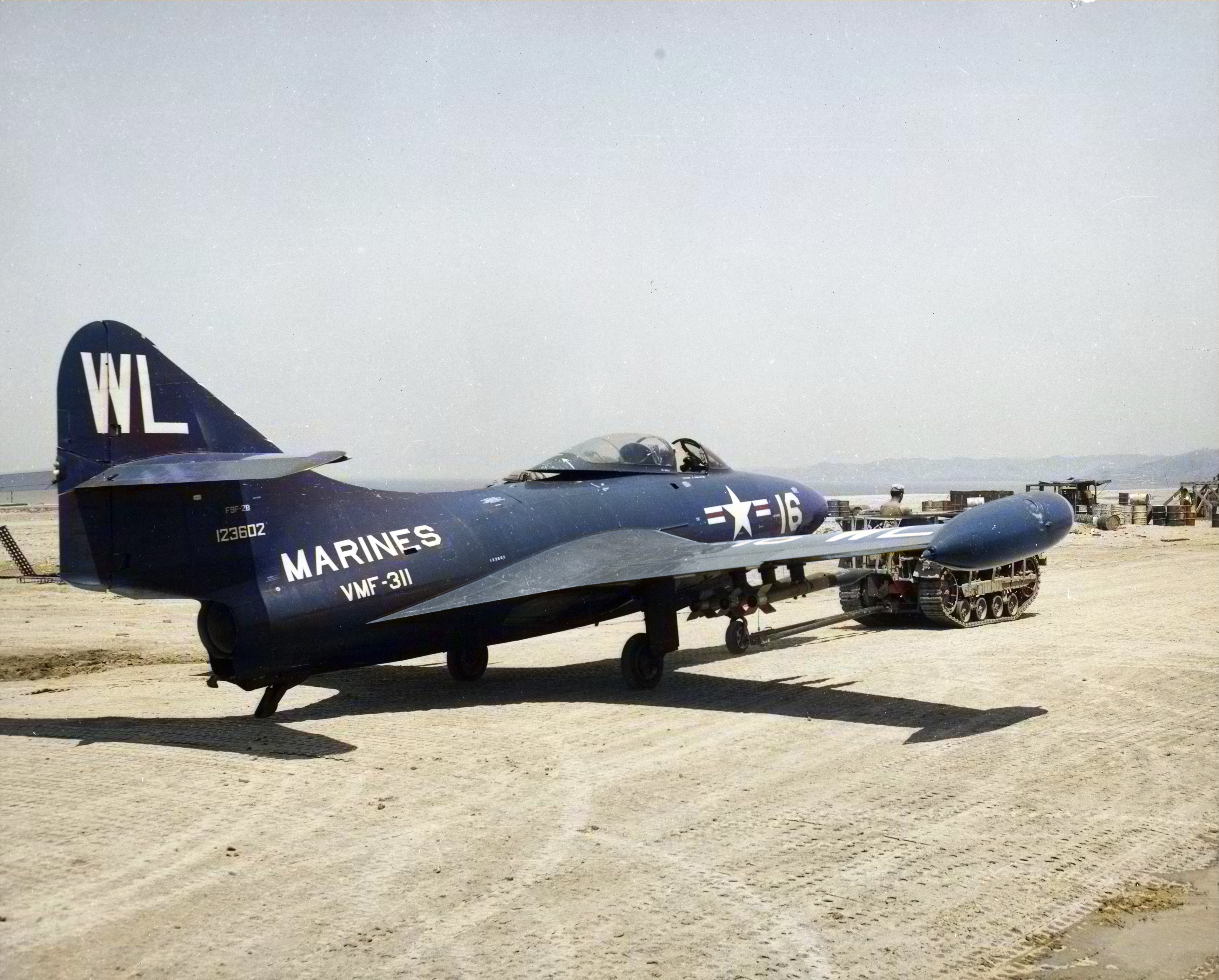 McDonnell Douglas F9F Panther USMC VMF-311 WL16 BuNo 123602 being towed to the runway hung Korea Dec 1950 ASC1