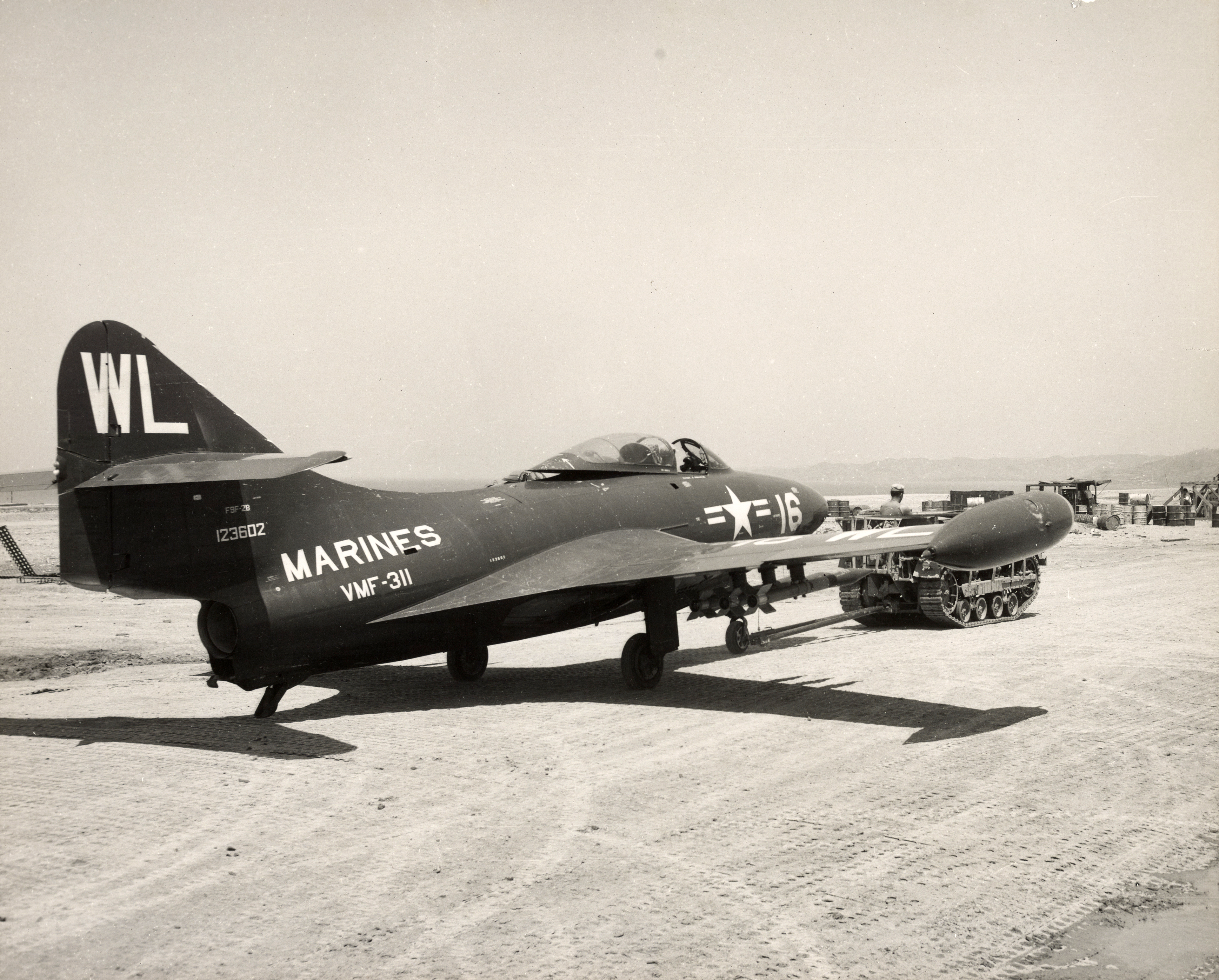McDonnell Douglas F9F Panther USMC VMF 311 WL16 BuNo 123602 being towed to the runway hung Korea Dec 1950