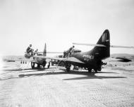 Asisbiz McDonnell Douglas F9F Panther USMC VMF 311 WL16 BuNo 123602 are refueling after rockets have been hung Korea 1951