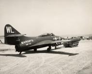 Asisbiz McDonnell Douglas F9F Panther USMC VMF 311 WL16 BuNo 123602 being towed to the runway hung Korea Dec 1950