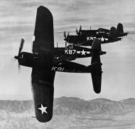 Asisbiz Vought F4U 1D Corsairs VMF 323 White K91 and K87 in formation 01