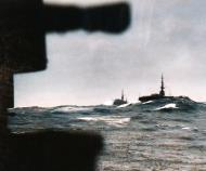 Asisbiz Carrier Division 27 successfully weathering China Sea Typhoon taken by USS Salerno Bay (CVE 110) Oct 1945 01