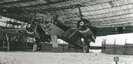 Asisbiz Dornier Do 17Z White G under camouflage netting based in France BW