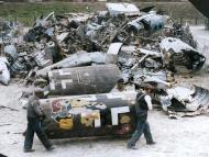 Asisbiz Workmen carry part of a bullet riddled Dornier Do 17 fuselage Battle of Britain Aug 1940 01